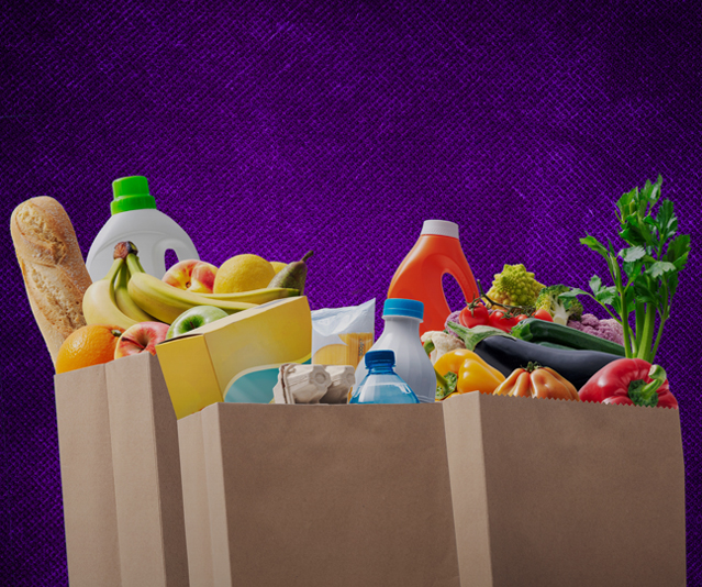 Full bags of groceries on a purple background